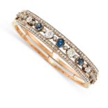 A FRENCH ANTIQUE SAPPHIRE AND DIAMOND BANGLE in 18ct yellow gold, set with a central row of