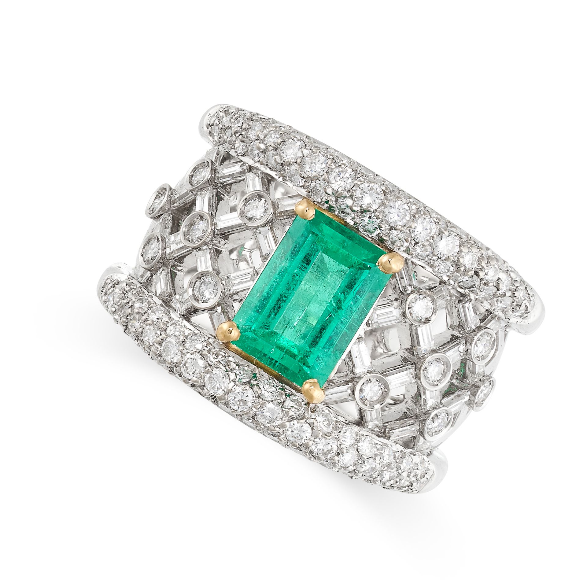 AN EMERALD AND DIAMOND RING in 18ct white gold, the tapering band of lattice design, set with a step