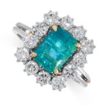 AN EMERALD AND DIAMOND RING in platinum, set with an emerald cut emerald of 2.42 carats, within a