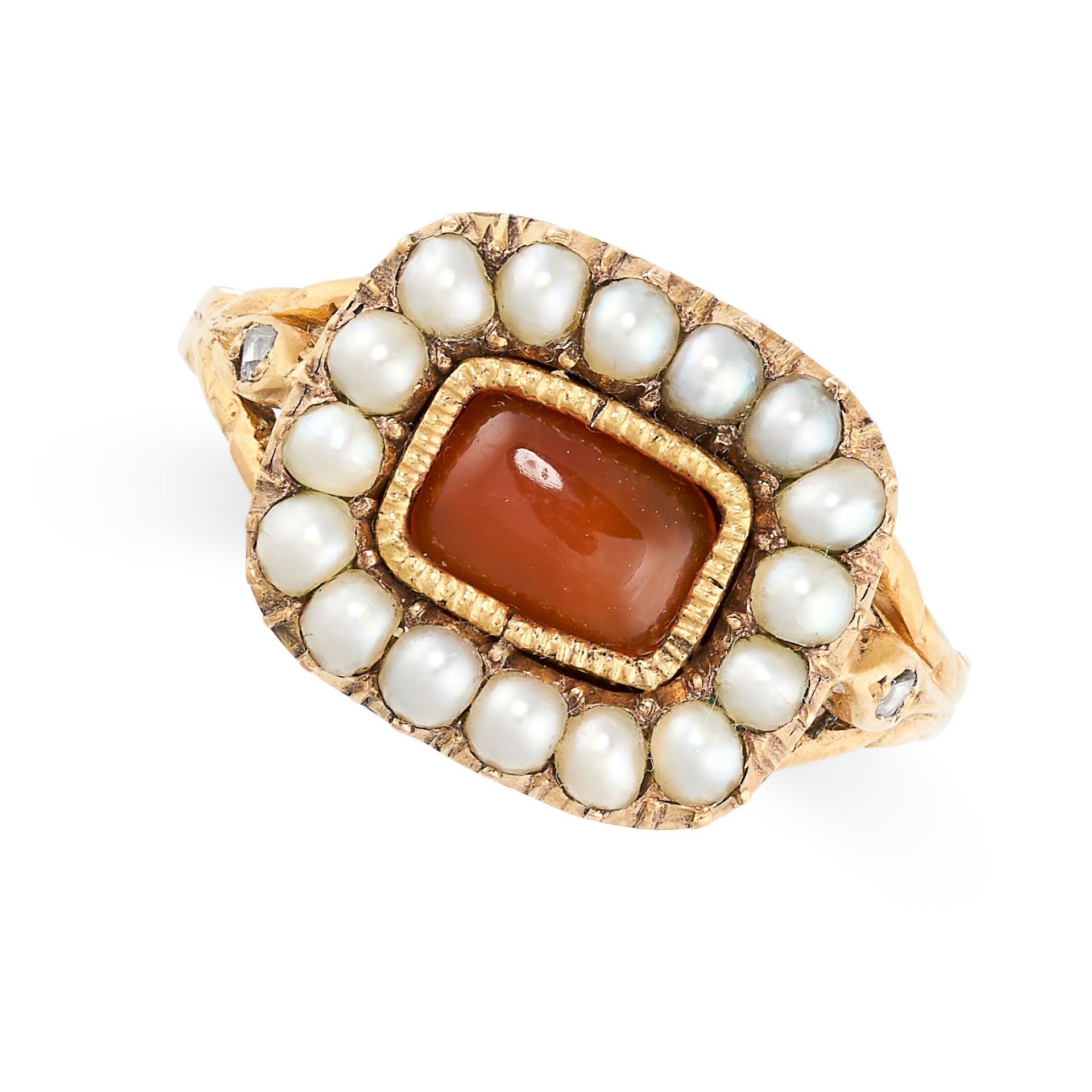 A CARNELIAN, PEARL AND DIAMOND RING in yellow gold, set with a cushion shaped cabochon carnelian