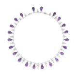 AN AMETHYST AND DIAMOND NECKLACE in 18ct white gold, designed as a fringe of graduated briolette cut