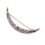 AN ANTIQUE SAPPHIRE AND DIAMOND CRESCENT MOON BROOCH