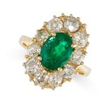 AN EMERALD AND DIAMOND CLUSTER RING