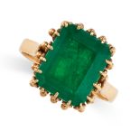 AN EMERALD DRESS RING  Step cut emerald, approximately 6.00 carats Stamped 750, indistinct assay