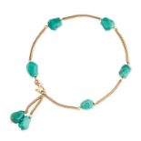 A TURQUOISE BRACELET  Polished turquoise beads, foxtail link chain Stamped K18  Length 190mm  7.4