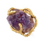 A MODERNIST AMETHYST RING  Rough amethyst crystal  No assay marks  Size M / 6  13.8 grams