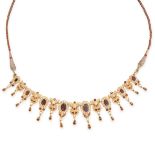 AN INDIAN GARNET AND PEARL NECKLACE Fringe design, chord back section Oval-shaped and circular-cut