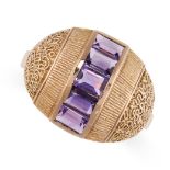 FAHRNER, A VINTAGE AMETHYST RING  Textured detail  Channel-set step-cut amethysts Stamped 585