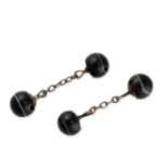 A PAIR OF BANDED ONYX CUFFLINKS  Polished banded onyx beads, 12.0mm  Length 50.0mm  10.9 grams