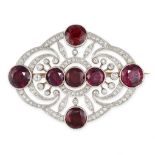 AN ANTIQUE BELLE EPOQUE GARNET AND DIAMOND PLAQUE BROOCH, CIRCA 1910 Scrolling motifs, millegrain