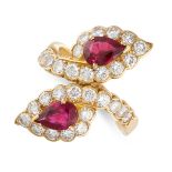 VAN CLEEF & ARPELS, A RUBY AND DIAMOND CROSSOVER RING  Pear-shaped rubies, totalling approximately