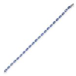 A SAPPHIRE AND DIAMOND LINE BRACELET  Oval-cut blue sapphires, approximate total 12.00-13.00 carats