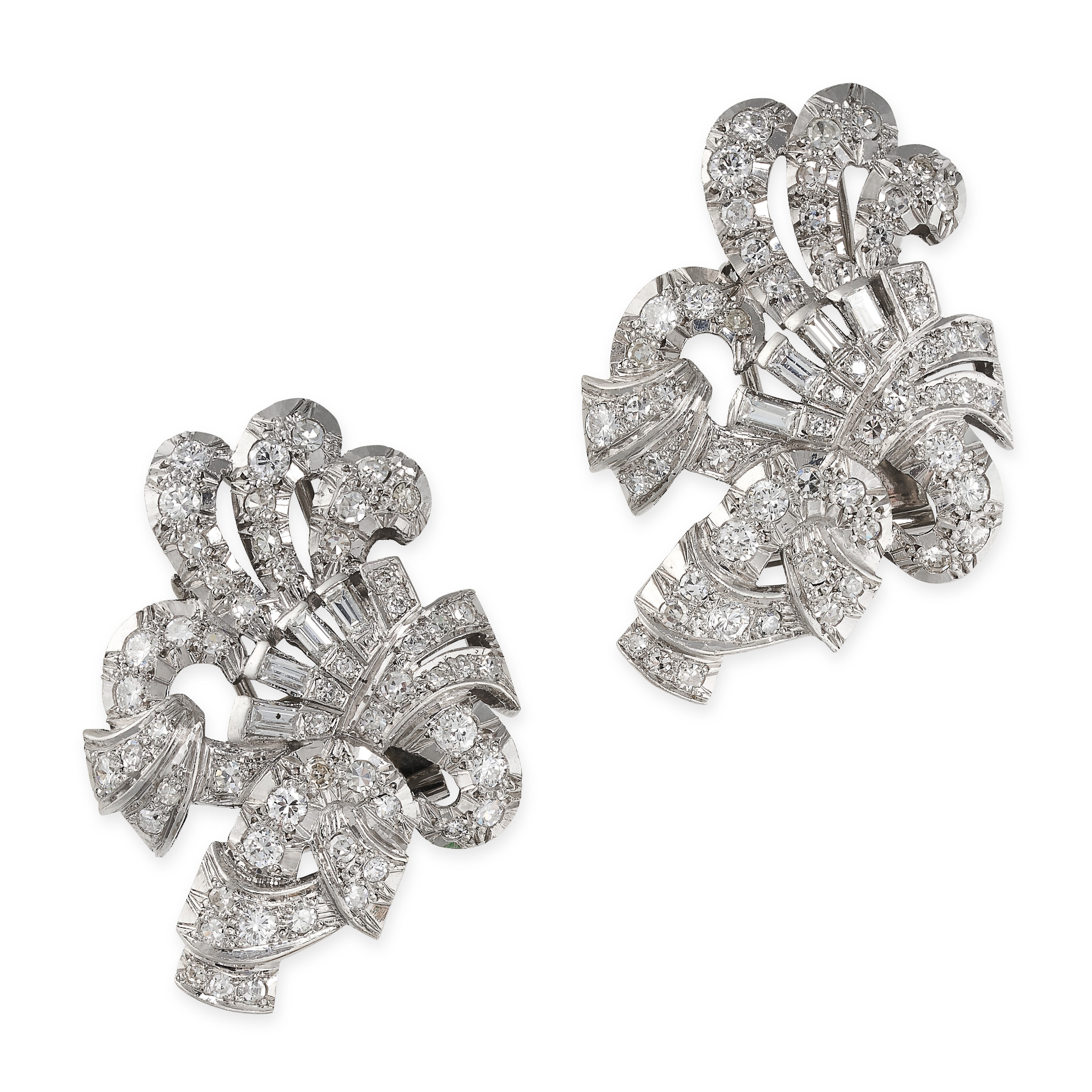 A PAIR OF VINTAGE DIAMOND SCROLL CLIP BROOCHES, MID 20TH CENTURY Brilliant, single and step-cut