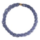 NO RESERVE - A TANZANITE BEAD TORSADE NECKLACE  Four rows of polished tanzanite beads, approximate