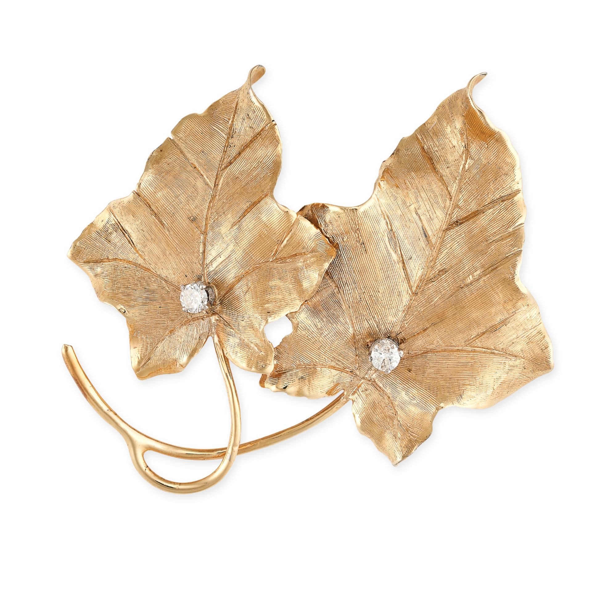 NO RESERVE - A VINTAGE DIAMOND LEAF BROOCH Made in 14 carat yellow gold, designed as two textured
