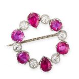 NO RESERVE - A RUBY AND DIAMOND BROOCH  Made in platinum, circular design  Cushion cut and pear