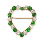 NO RESERVE - AN ANTIQUE TSAVORITE GARNET AND DIAMOND HEART BROOCH  Made in yellow gold, designed