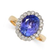 NO RESERVE - A TANZANITE AND DIAMOND CLUSTER RING Made in 18 carat yellow gold  Oval cut