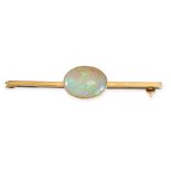 NO RESERVE - AN ANTIQUE OPAL BAR BROOCH  Made in yellow gold  Oval cabochon opal, weighing