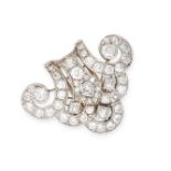 NO RESERVE - AN ART DECO DIAMOND CLIP BROOCH, 1930S Made in platinum and 18 carat white gold, scroll