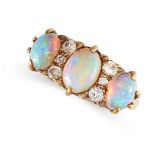 NO RESERVE - AN ANTIQUE OPAL AND DIAMOND DRESS RING  Made in yellow gold  Three graduated oval