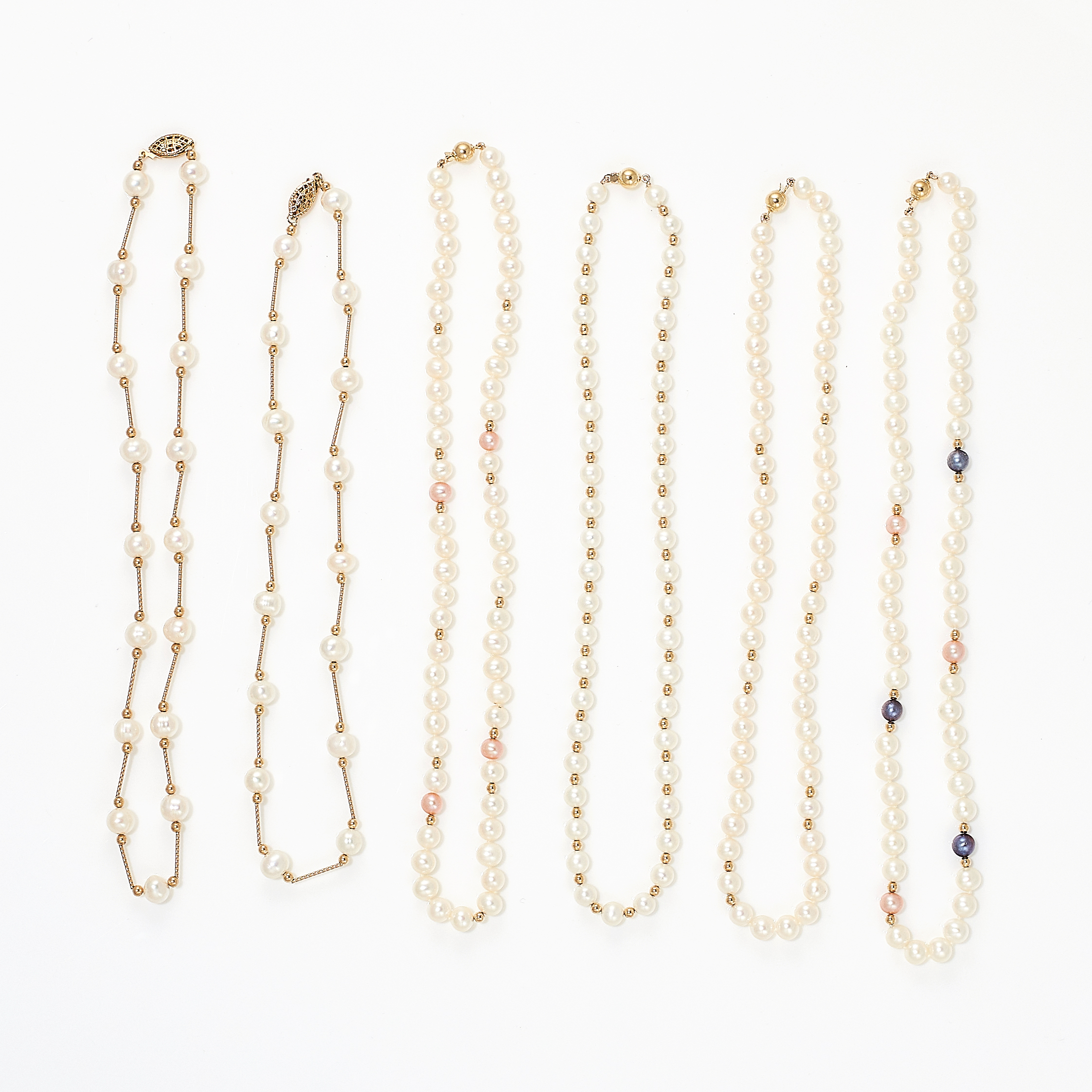 A MIXED LOT OF PEARL NECKLACES comprising of two necklaces formed of a single row of pearls, beads