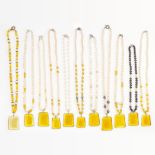 AN ASSORTED LOT OF FAUX PEARL NECKLACES comprising of eleven faux pearl necklaces, some with faceted