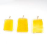 AN ASSORTED LOT OF PENDANTS comprising of three yellow reverse carved intaglio pendants, 5.0cm-6.