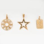 AN ASSORTED LOT OF PENDANTS comprising of a pendant in the form of a star, a round pendant