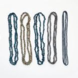 A MIXED LOT OF FIVE COLOURED PEARL NECKLACES comprising of three single rows of blue pearls, a