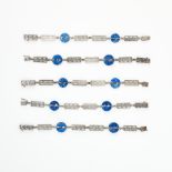 FIVE SODALITE BRACELETS comprising of three silver bracelets set with polished sodalite discs and