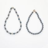 A MIXED LOT OF TWO FAUX PEARL NECKLACES comprising of a single row of alternating grey and black