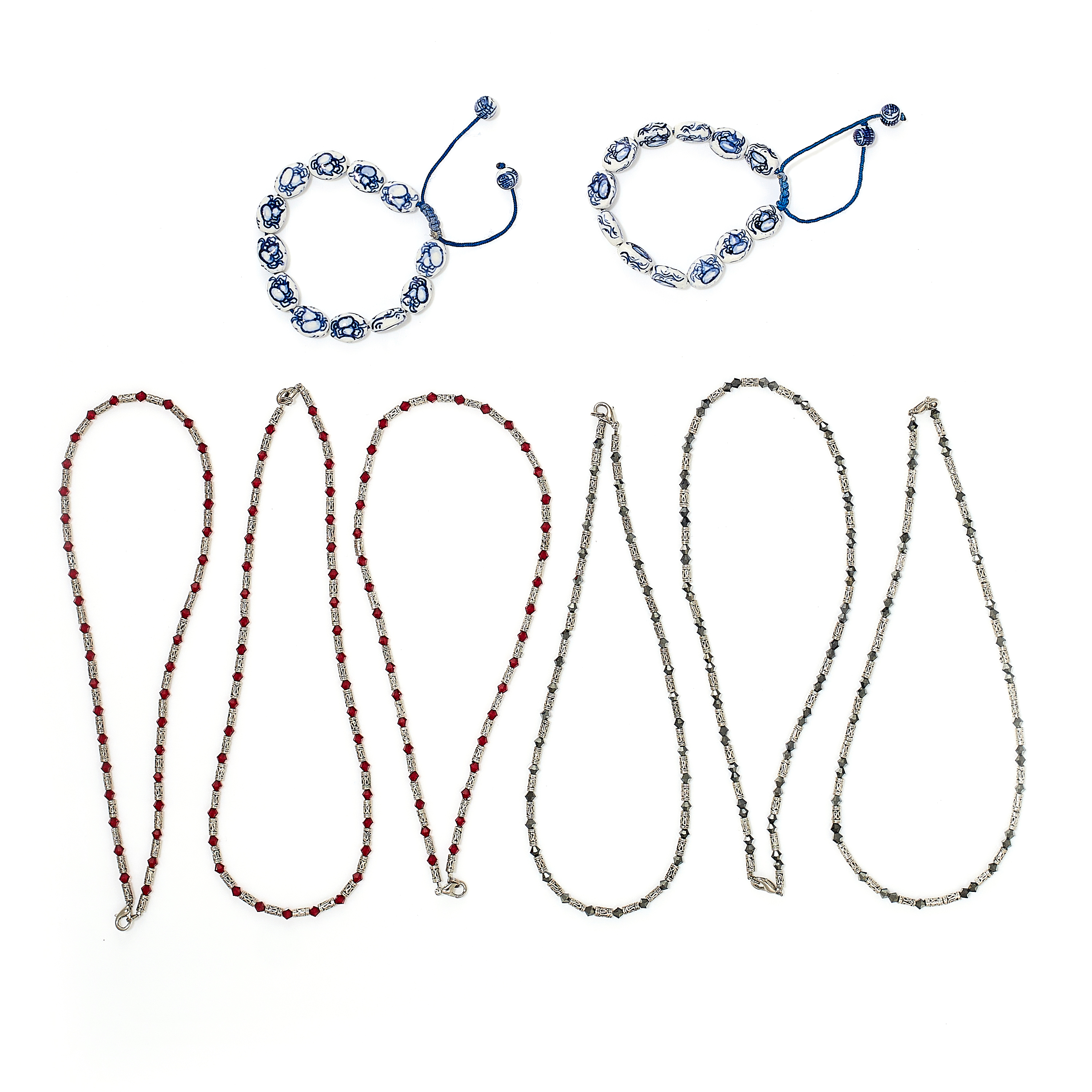 A MIXED LOT OF JEWELLERY comprising of fifteen red glass and silver bead necklaces, three black - Image 2 of 2