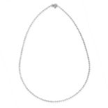 A SPECTACLE-SET DIAMOND NECKLACE  Brilliant-cut diamonds  British hallmarks for 18ct gold  Length