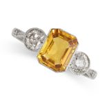 A YELLOW SAPPHIRE AND DIAMOND THREE-STONE RING