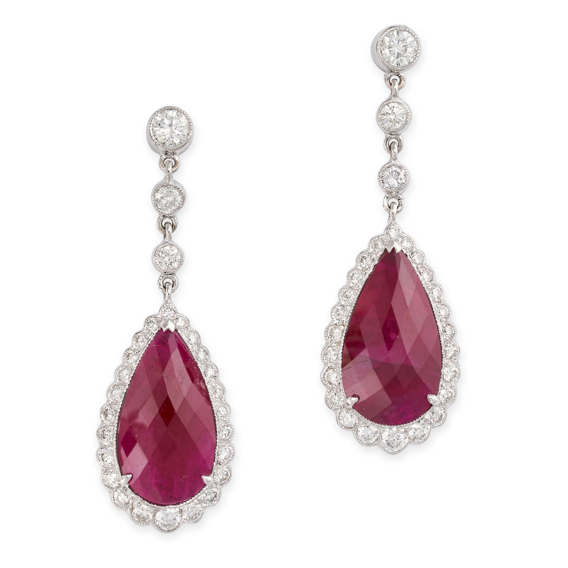 A PAIR OF RUBY AND DIAMOND DROP EARRINGS  Post fittings Pear faceted rubies, approximate total 5.