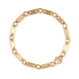 CARTIER, A FANCY LINK BRACELET  Alternating oval and fancy links  Signed Cartier, stamped 750