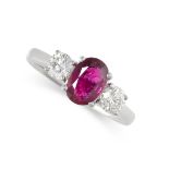 A RUBY AND DIAMOND THREE STONE RING  Made in 18 carat white gold  Oval cut ruby, weighing