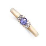 NO RESERVE - A TANZANITE AND DIAMOND DRESS RING  Round cut tanzanite  Brilliant cut diamonds