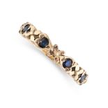 NO RESERVE - A SAPPHIRE DRESS RING  Made in 9 carat yellow gold  Round cut sapphires  Full British