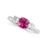 A RUBY AND DIAMOND THREE STONE RING Made in 18 carat white gold  Cushion cut ruby, weighing