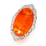 AN EXCEPTIONAL FIRE OPAL AND DIAMOND NAVETTE-SHAPED CLUSTER RING  Oval cabochon fire opal,