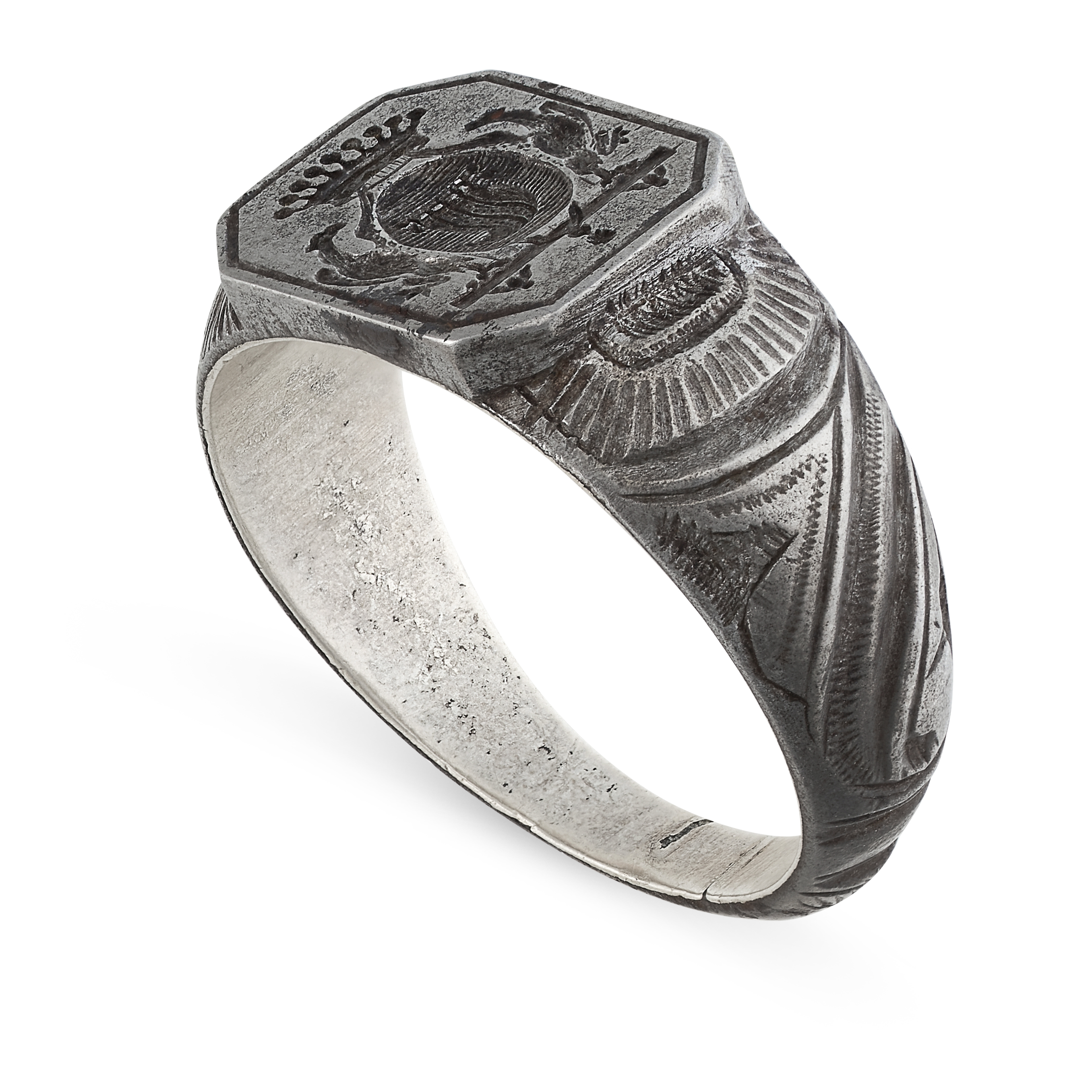 AN ANTIQUE STEEL INTAGLIO SEAL / SIGNET RING  The face reverse carved in detail to depict a coat - Image 2 of 2