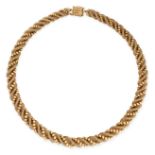 A VINTAGE GOLD GASPIPE NECKLACE  Wrapped with two strands of gold beads  Stamped 18K, in 18 carat