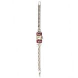 A LADIES ART DECO RUBY AND DIAMOND WRISTWATCH, 1930S  The square silvered dial with dot and baton