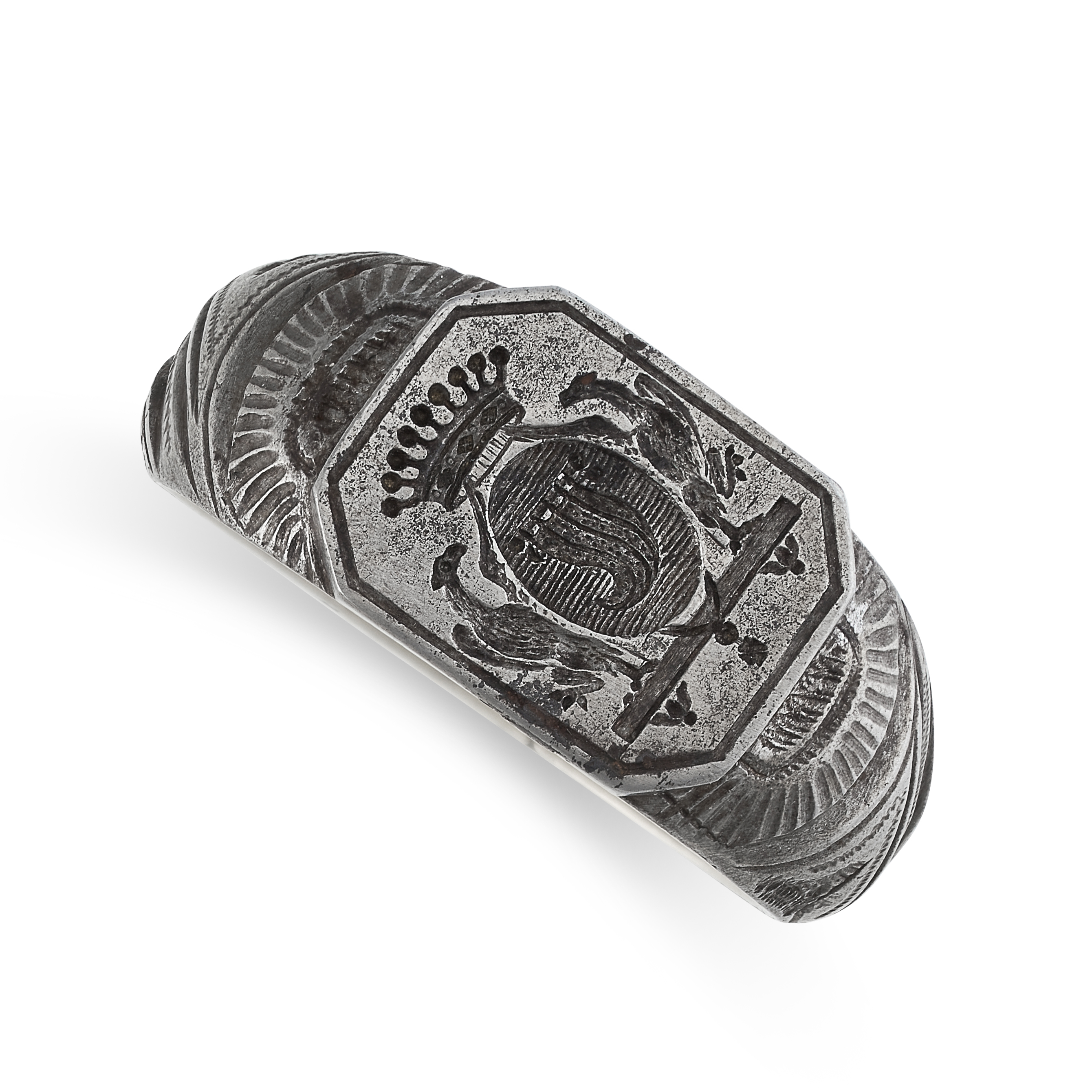 AN ANTIQUE STEEL INTAGLIO SEAL / SIGNET RING  The face reverse carved in detail to depict a coat