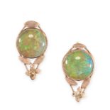 A PAIR OF VINTAGE OPAL CLIP EARRINGS  Screw back fittings, foliate accents  Round cabochon opals,