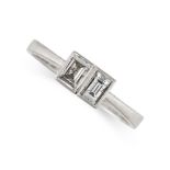 NO RESERVE - A VINTAGE DIAMOND DRESS RING in platinum, the band set to the front with two