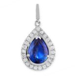 A FINW TANZANITE AND DIAMOND PENDANT set with a pear cut tanzanite weighing 7.78 carats in a