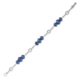 A SAPPHIRE AND DIAMOND BRACELET set with trios of graduated oval cabochon blue sapphires accented by